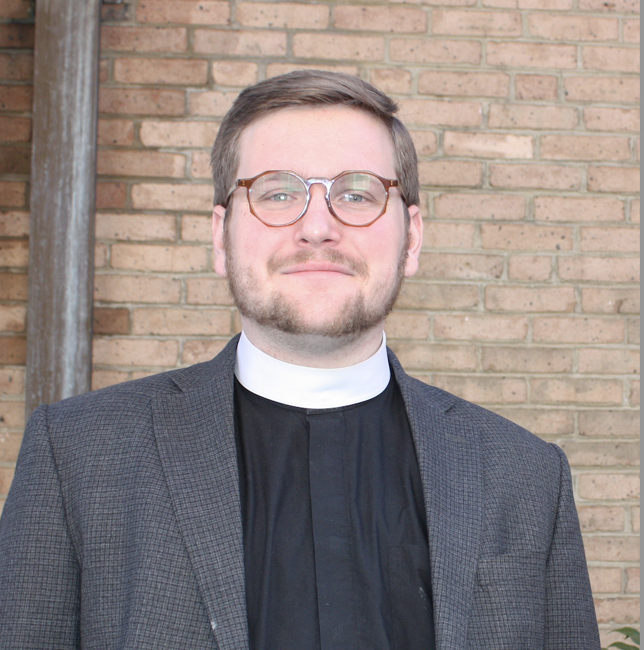 The Reverend Chase, looking pastoral